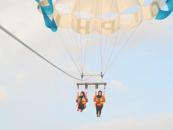 Nusa Dua Watersports Extravaganza: Parasailing, Tubing, and Diving Adventures