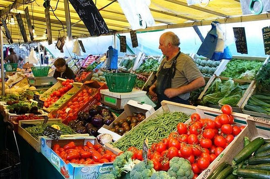 Discover Culinary Delights in the Marais Neighborhood: A Guided Walking Tour of Local Food Markets